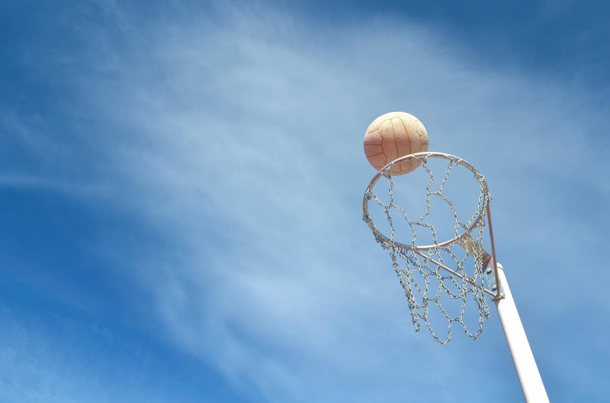 Netball players in action during a series match