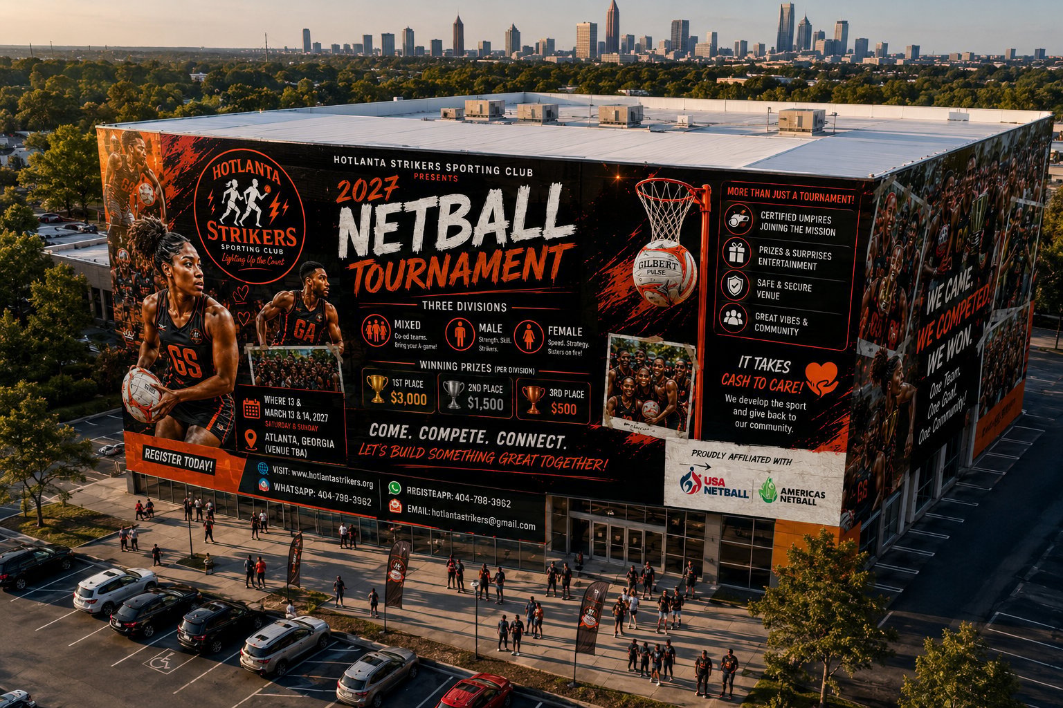Large building exterior wrapped with black and gold netball tournament advertisement, aerial view with city skyline and street below